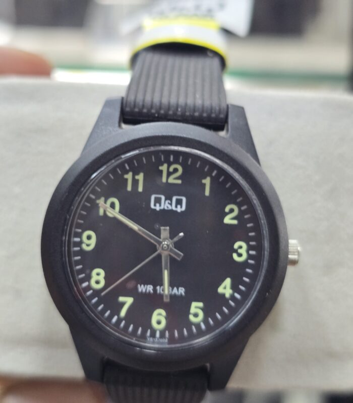 Reloj QyQ